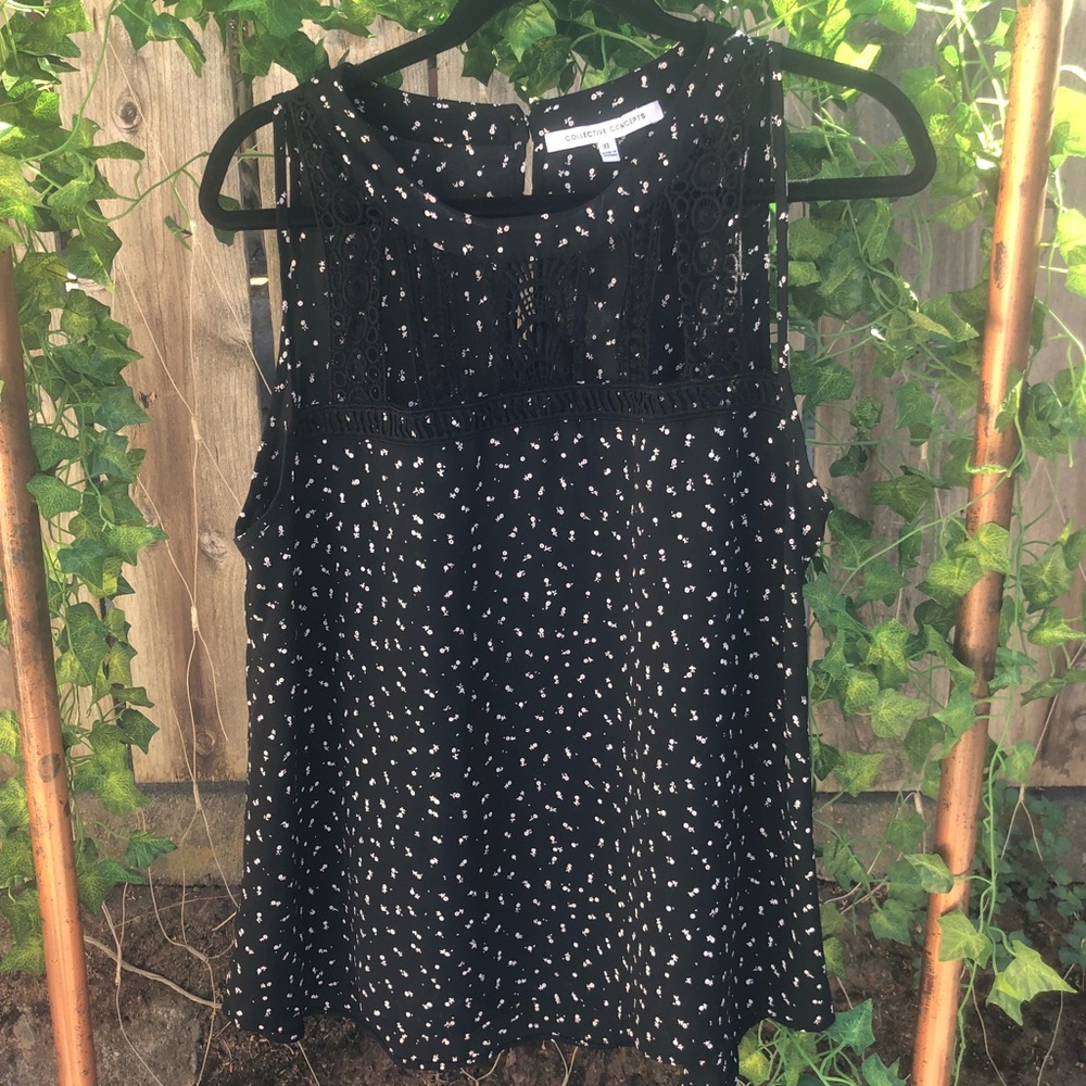 Black tank with embroidery detail cutouts